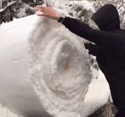 南方人体会不到的冬季玩雪滚毛毯