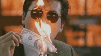 发哥用钱点烟的经典GIF动态图片